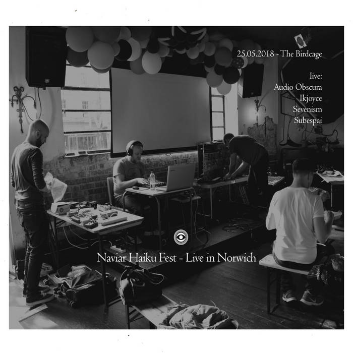 Live In Norwich album cover. A monochrome image capturing individuals gathered in a room.